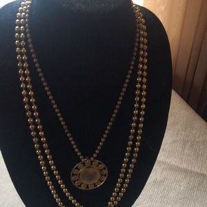 Gold bib necklace